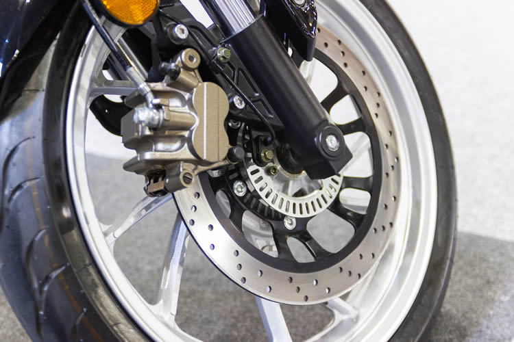 Close-up view of a front motorcycle wheel